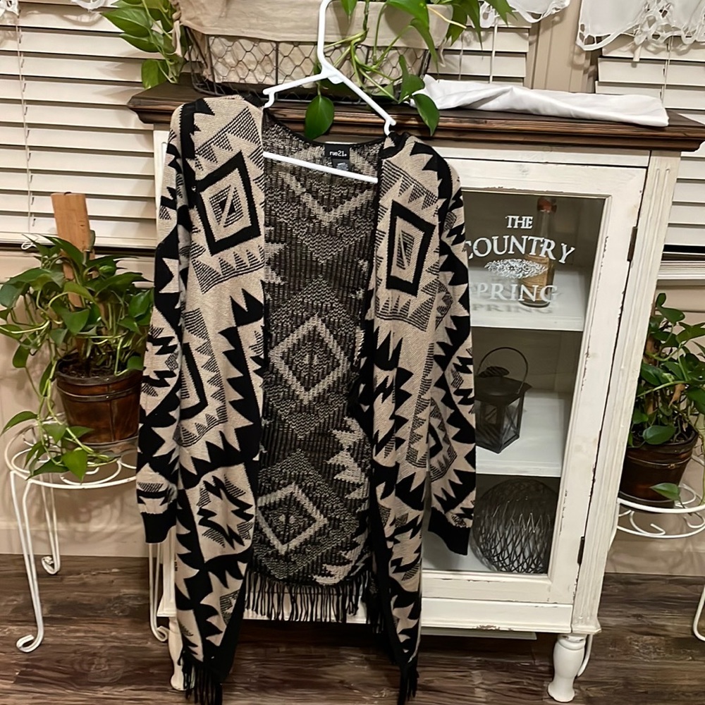 Rue21 small tan& black sweater/cardigan with fringe Gently used